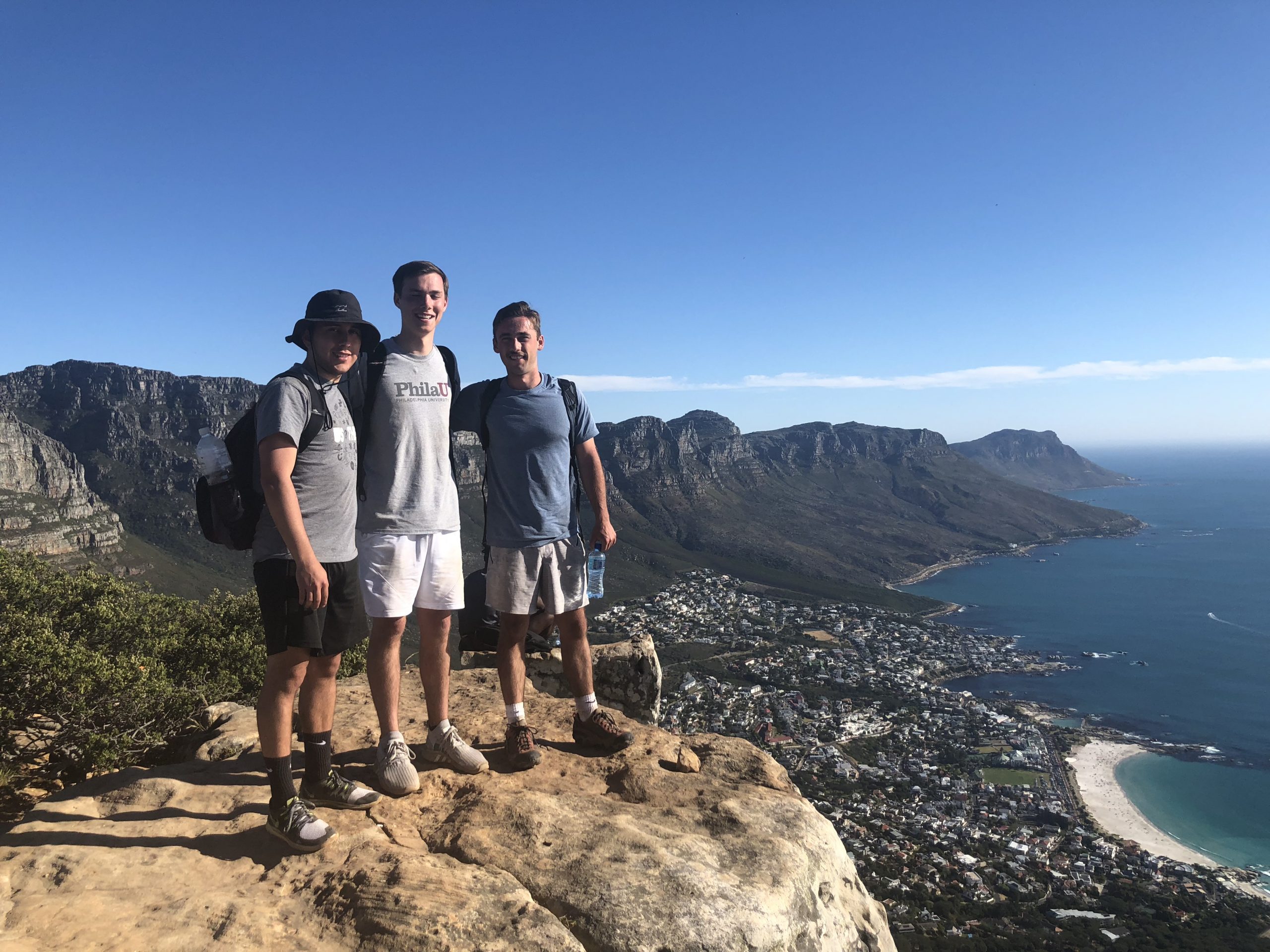 Photo of MLT Career Prep Alum Dennis Constanza with friends during his study abroad experience in South Africa